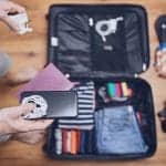 Packing a suitcase with travel gadgets